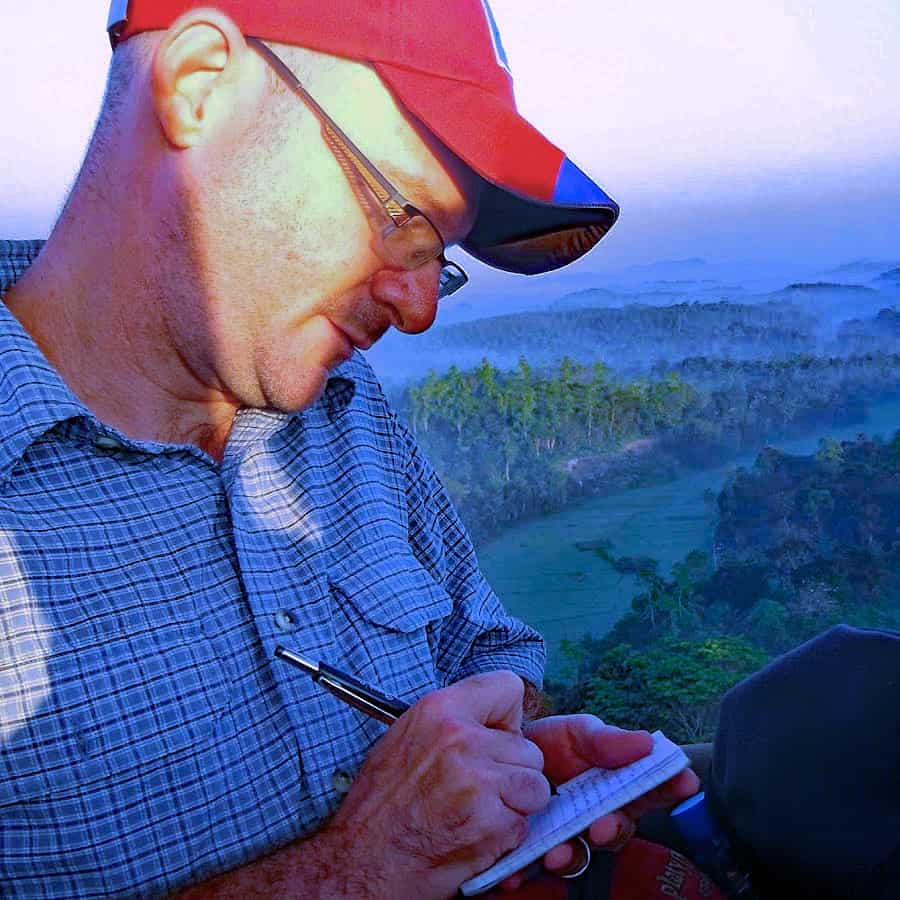 Dave Fox jots notes while on location