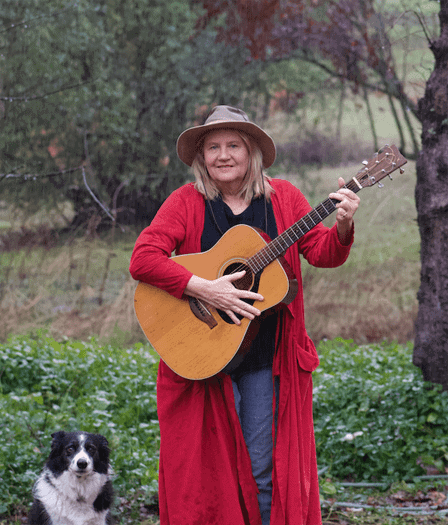 Poet and songwriter Sara Hoxie and her wonderdog Niki